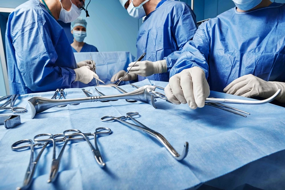 doctors around the surgery table