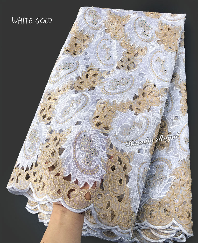 white and gold lace fabric