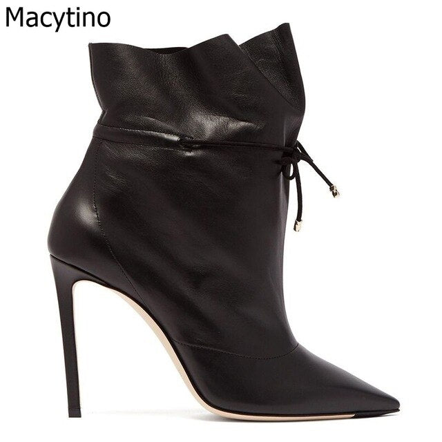 black pointed toe heeled boots