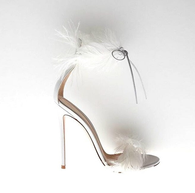 heels with feathers on front