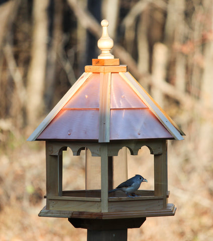 Fancy bird feeder with copper roof