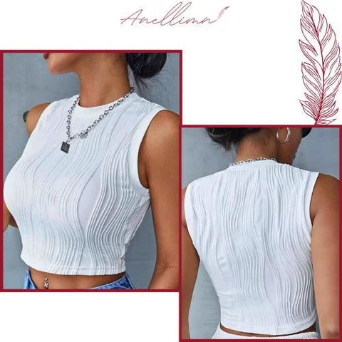 Cropped feminino plissado em malha de alta qualidade, com decote redondo e acabamento sofisticado. Ideal para looks casuais ou elegantes.