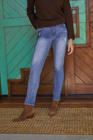 woman wearing tall jeans