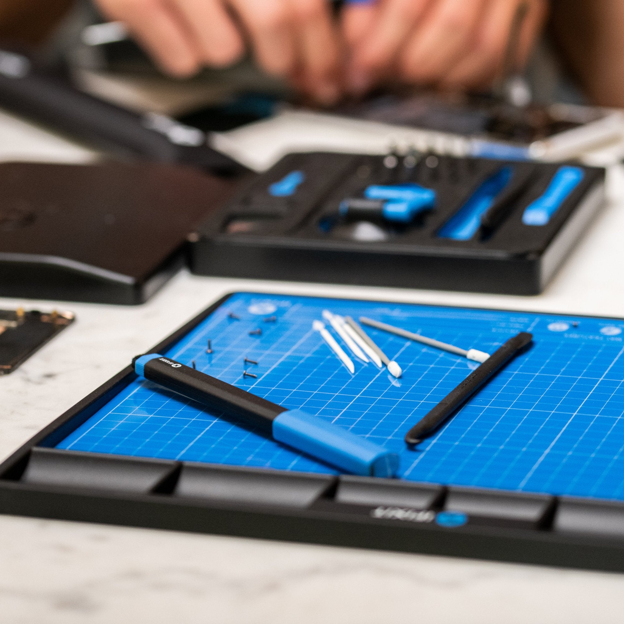 Ready go to ... https://www.ifixit.com/products/fixmat [ FixMat: Magnetic Screw Mat]