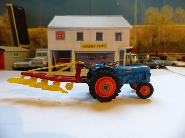 A small collection of Corgi Toys farm vehicles and accessories, comprising  a No. 54 Fordson 'Po