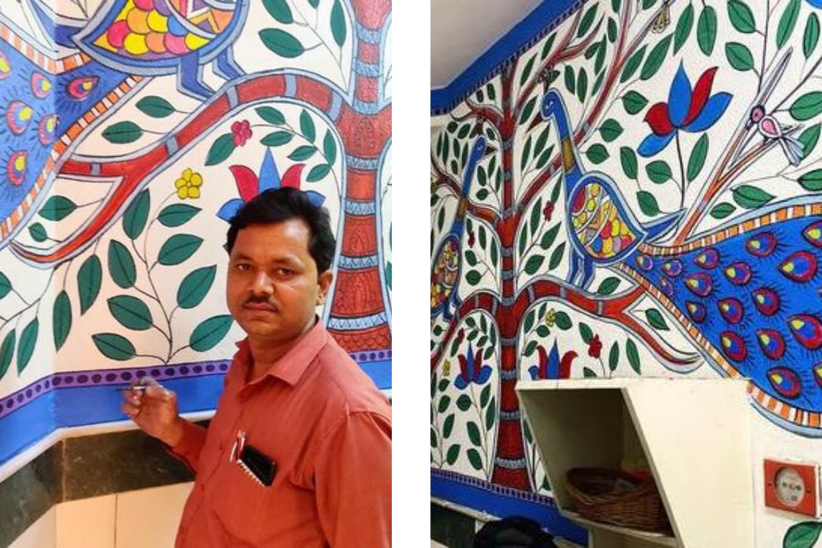 The artist, Mr. Jaiprakash, alongside the mural he has painted 