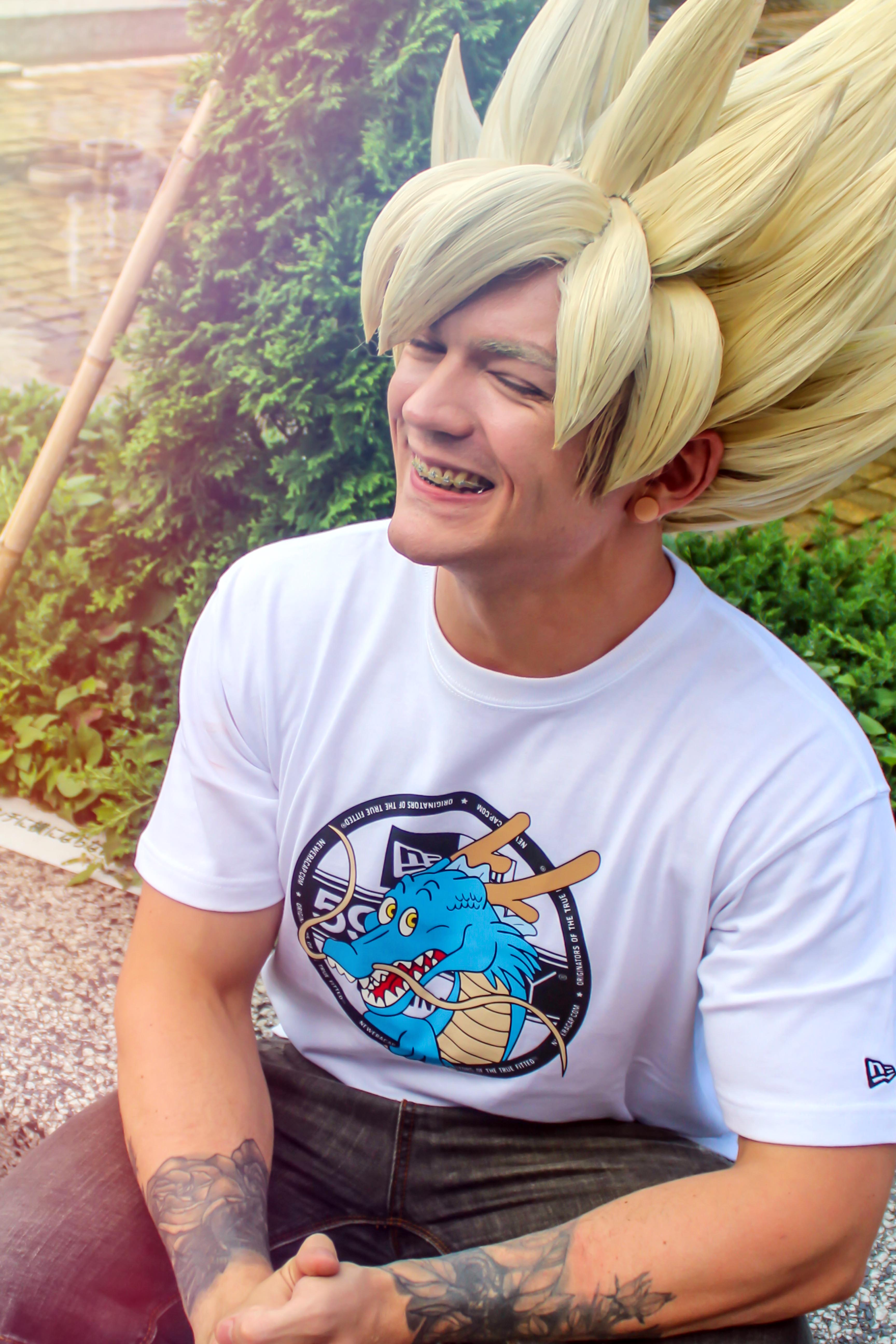 Casual Goku cosplay smiling in the Tokyo sun