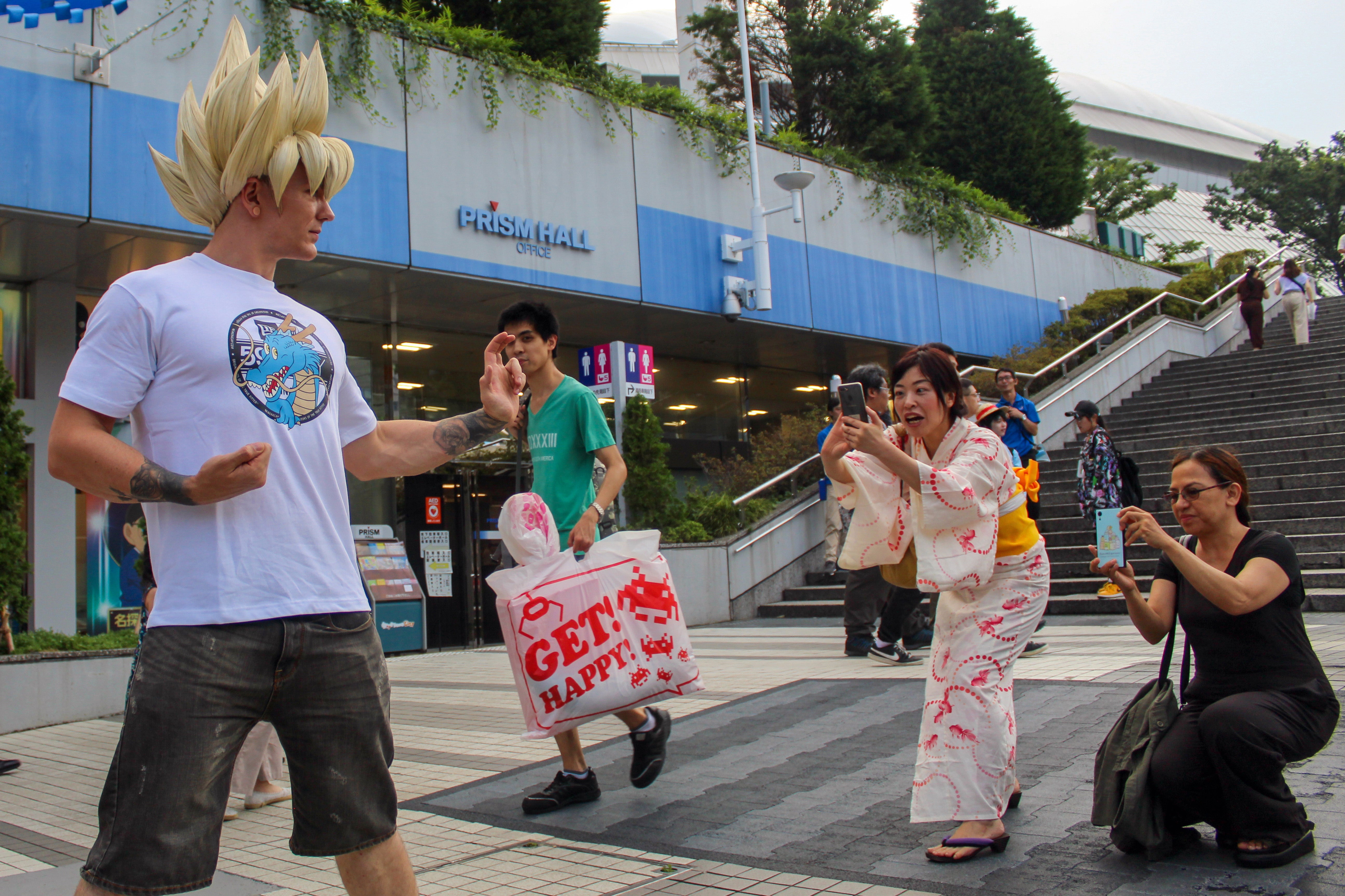 Very excited Japanese Dragon Ball fan has her mind blown by a United Kingdom Son Goku cosplayer at World Cosplay Summit 2019