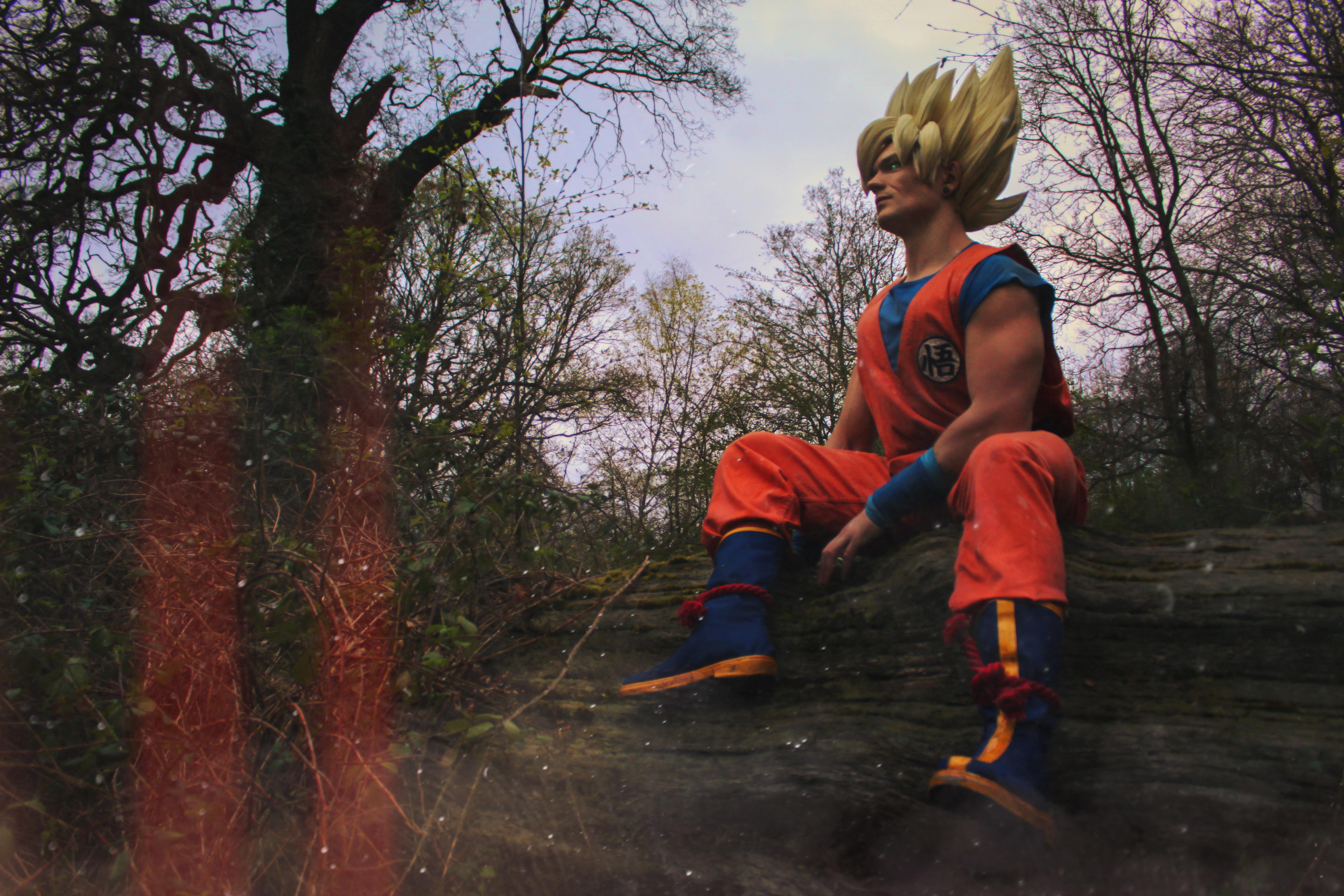 Super Saiyan Son Goku cosplay from DragonBall Z sat in nature