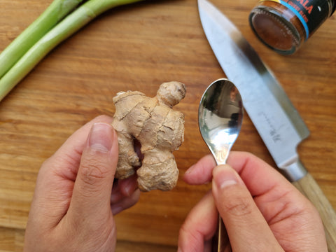 Peel a ginger with a spoon