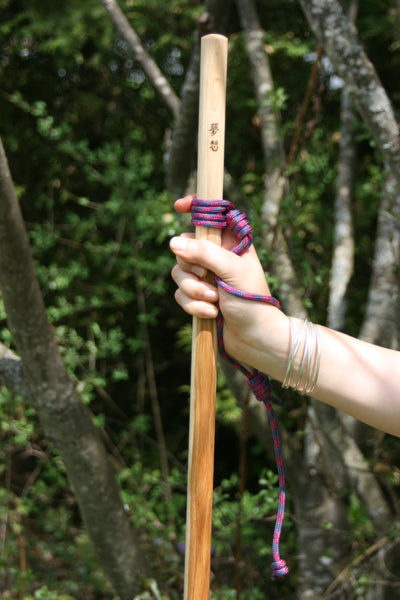 wooden hiking stick with lanyard
