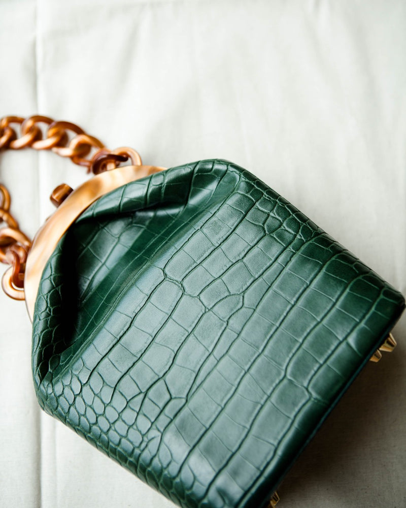 green mock croc handbag