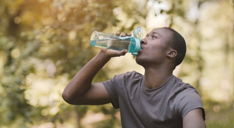 man drinking water