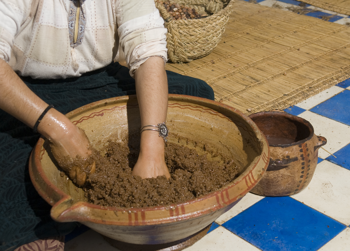 woman making argan oil