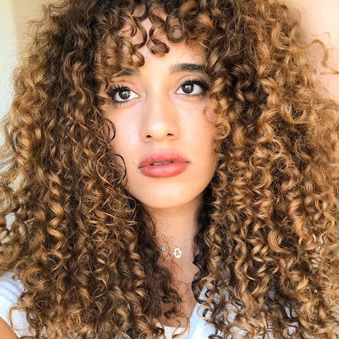Wavy and curly bangs