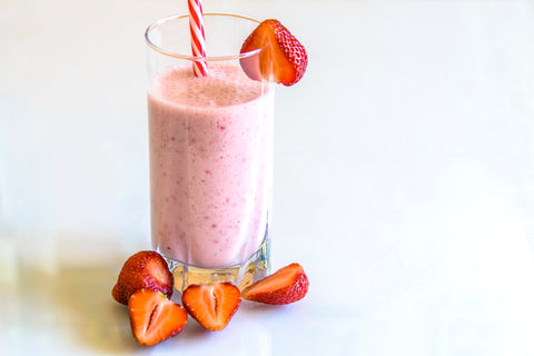 Strawberry smoothie on a white counter