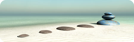 Zen beach with smooth rocks laid in a soothing pattern