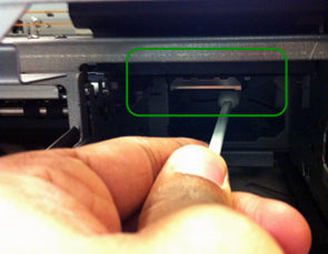 FIG 2: Regular maintenance, like cleaning the print head, is key to keeping your printer running smoothly.