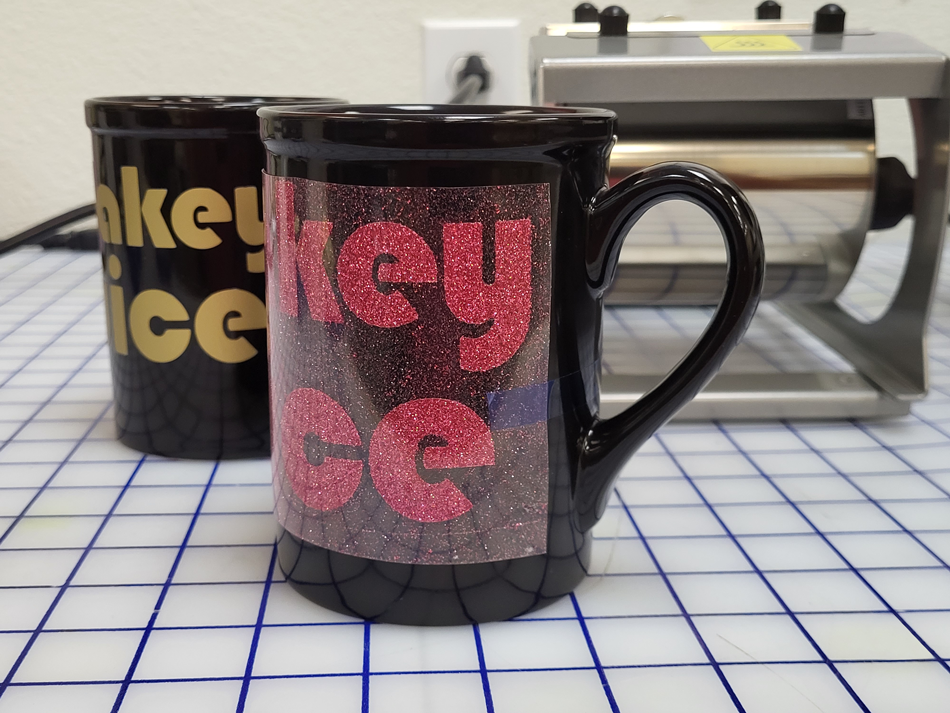Logical Color Glittersoft applied to a black un-coated dollar store mug. Allow ample time for the film to cool before removing the liner.