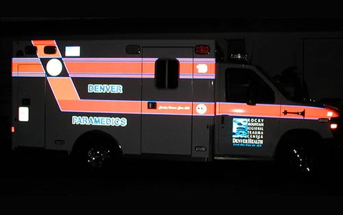 Emergency vehicle using reflective vinyl to be more visible at night