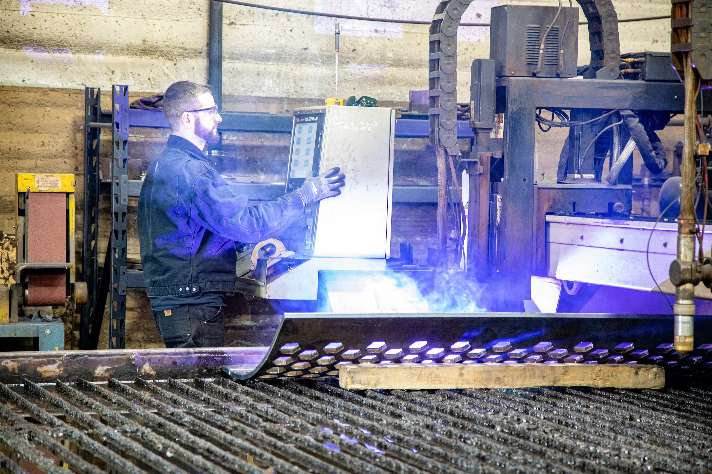 Hy-Def plasma burning table being programmed for steel processing