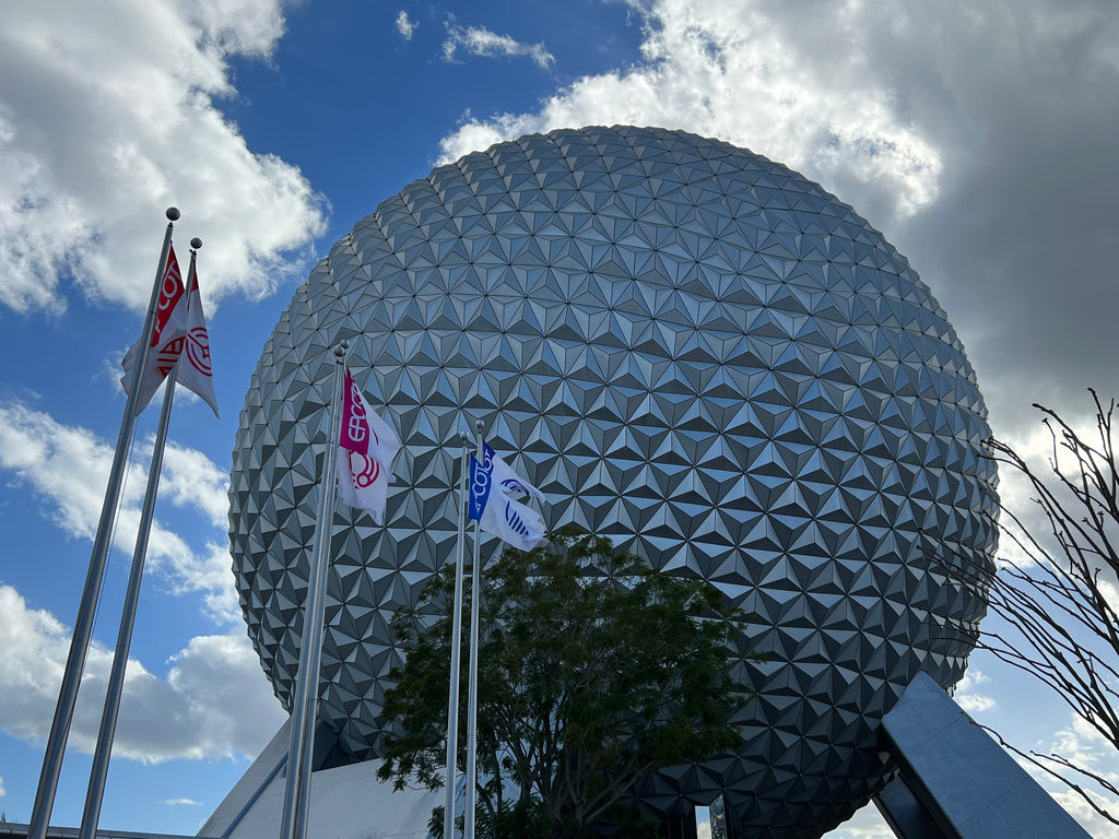 Spaceship Earth with flags blowing in the wind