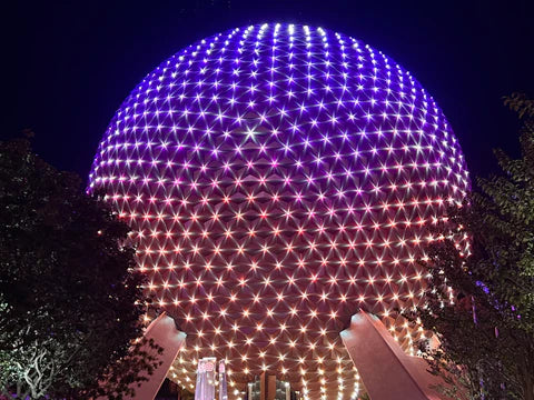 EPCOT Ball illuminated at night