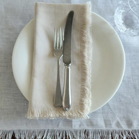 Stone-Frayed-Linen-Table-Napkins.jpg__PID:d04b731d-bbe6-45e2-9c14-34838db8b51c