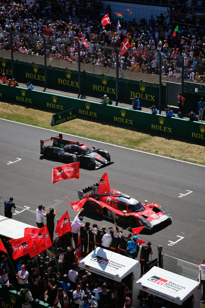 The winning team of The 24th Hours Of Le Mans, Toyota Gazoo crossing the finish line after the extremely long and endless race in France, blog article created for the event by Roveri Eyewear, June 2022.