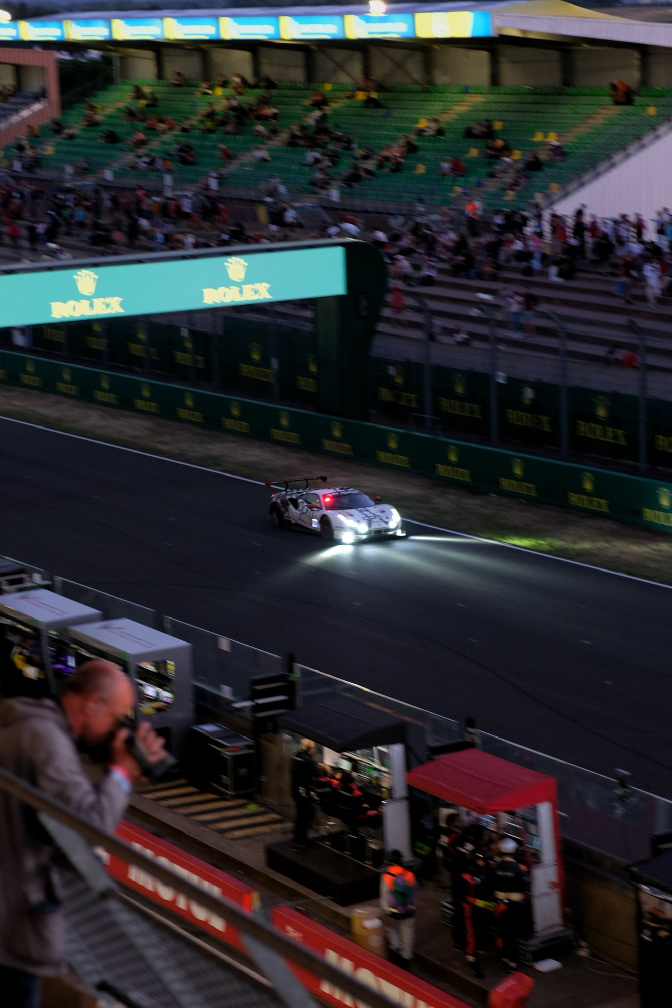 90th edition of The 24 hours of Le Mans, night race begins while the night approaches over the circuit in France.