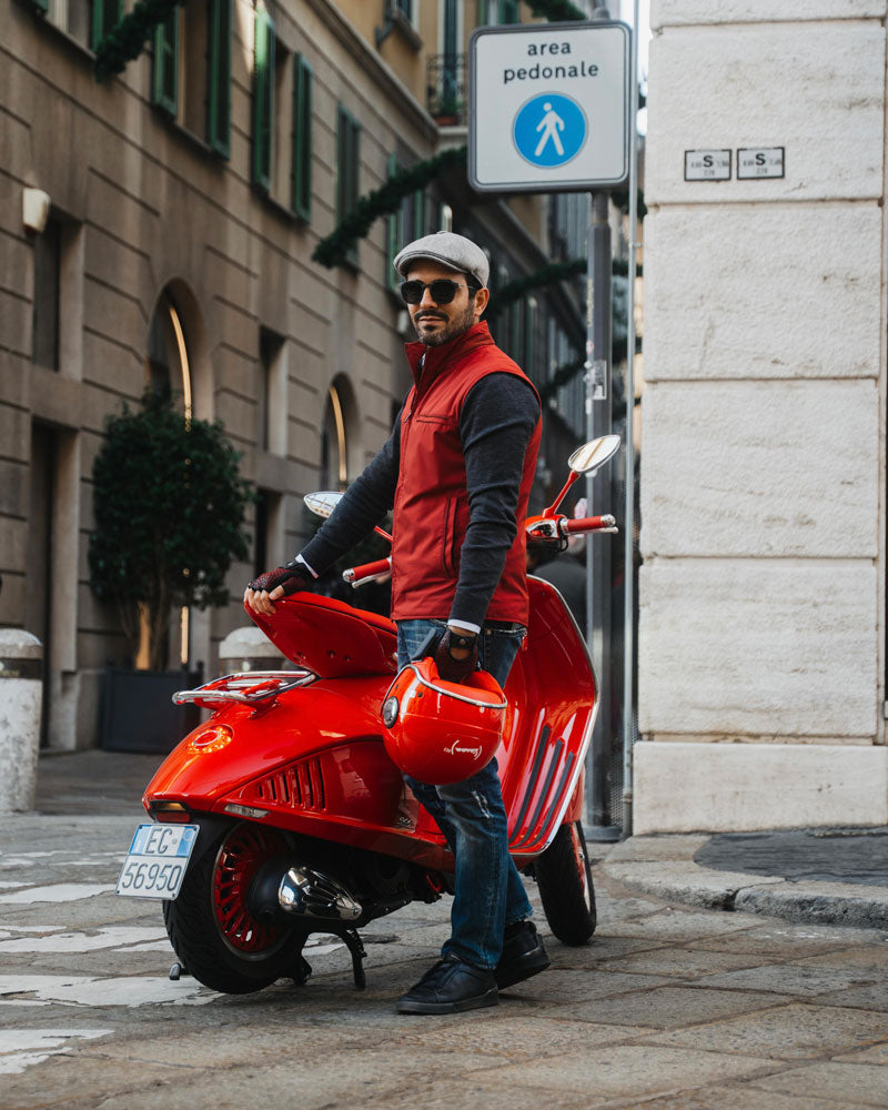 Andrea Mazzuca in Milan, Italy with the Vespa 946 RED for the Roveri Eyewear photoshoot with the CLM7 Havana carbon-titanium sunglasses.