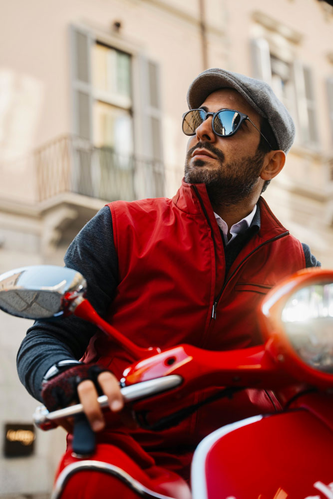 Andrea Mazzuca for Roveri Eyewear with the Vespa 946 RED photoshoot with the carbon-titanium CLM7 Havana in Milan, Italy.