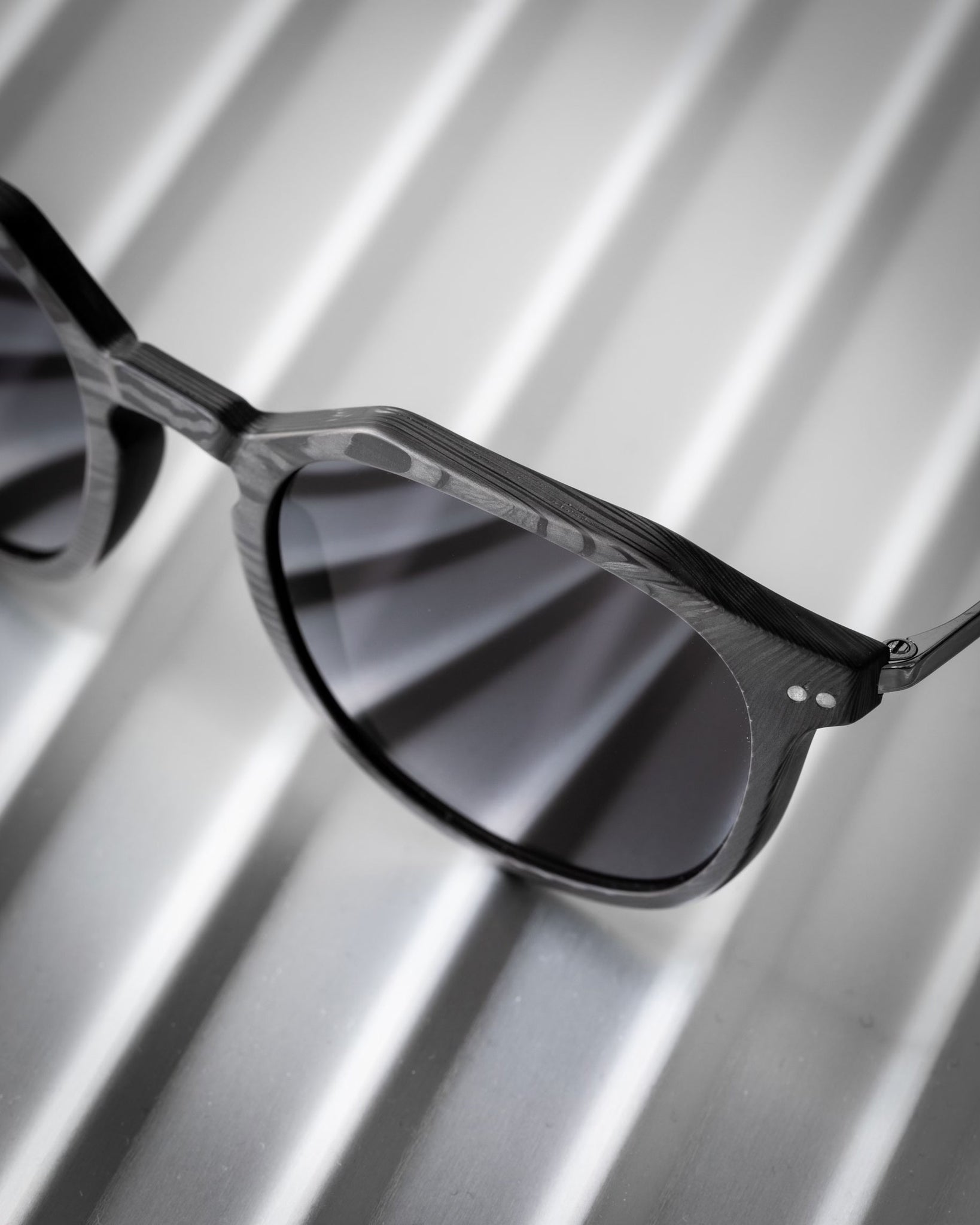Roveri Eyewear all new CLM7 carbon-titanium sunglass frame with Rimowa Cabin Classic photoshoot.