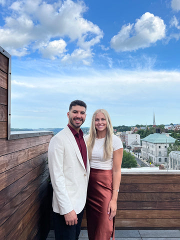 Photo of Lauren and Christian on a Rooftop