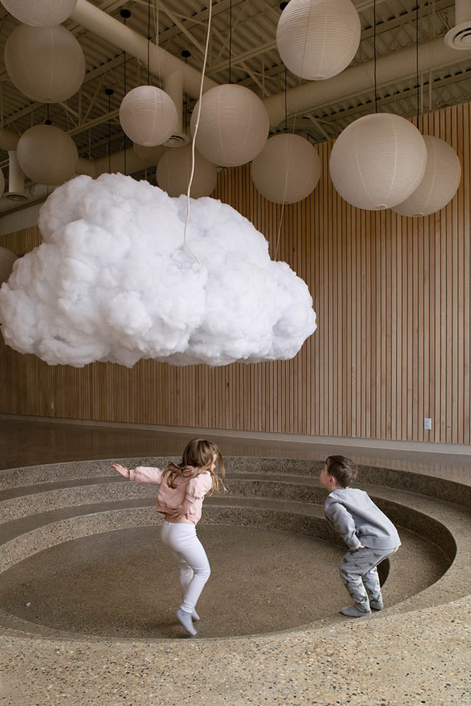 Children playing under Cloud