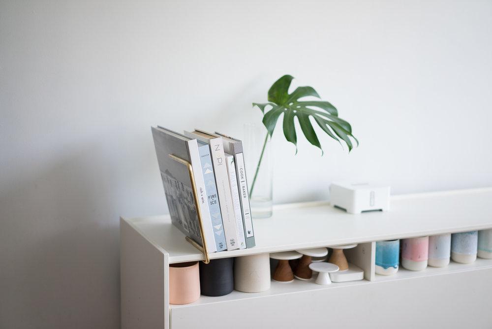 Lean with books and leaf