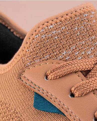 A close-up image of the Vessi Weekend eco-friendly sneakers displaying the unique waterproof material