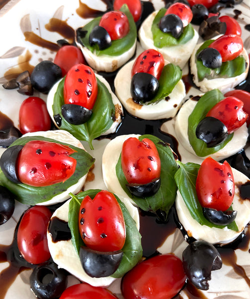 platter of caprese ladybugs