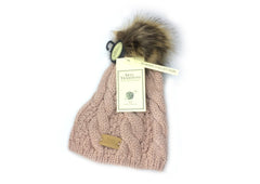 faux fur pom pom cable knitted beanie hat in the colour blush