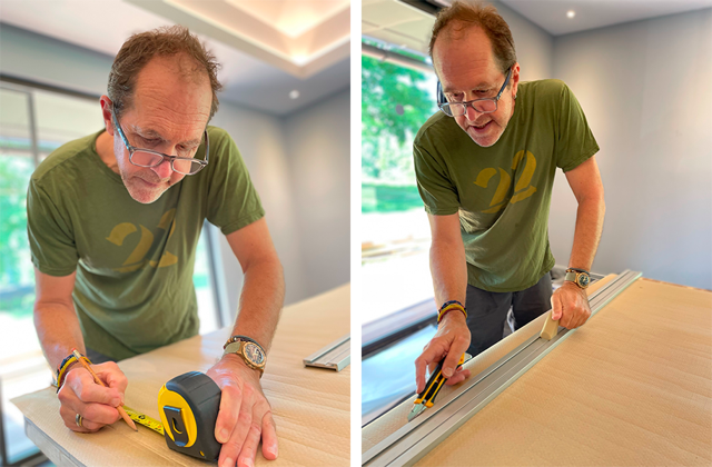 Side by side image of man leaning over a table to cut grasscloth wallpaper