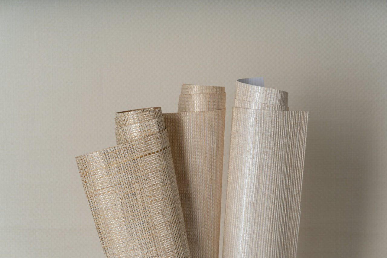 Three rolls of shimmery paperweave and jute wallpaper
