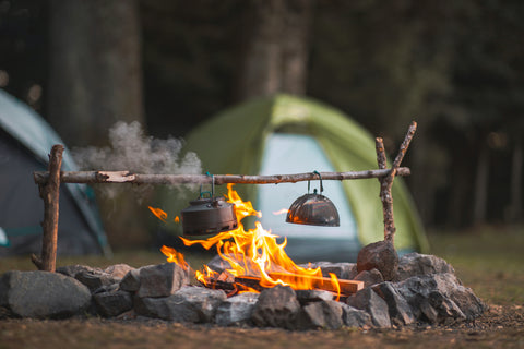 A fire and a tent.