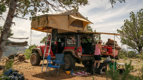 roof-top-tent-mounted-on-keep-with-shade-awning-in-the-wilderness