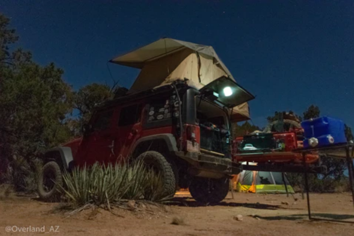 overland-camping-gear-setup-at-night