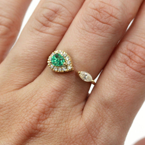 emerald and diamond marquise ring in gold