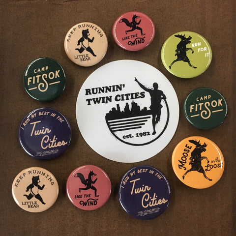 Various event pins laid out in a circle