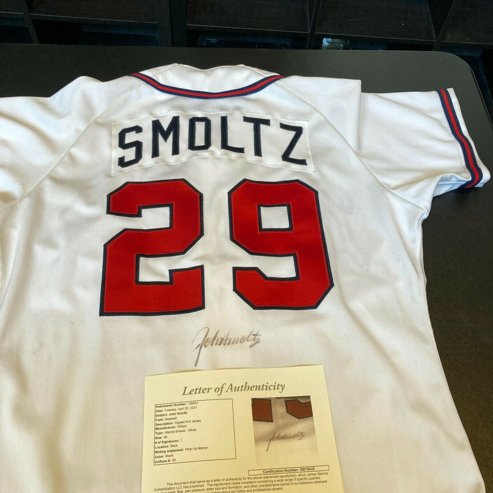 John Smoltz player worn jersey patch baseball card (Atlanta Braves) 2002  Leaf Rookies & Stars #SS49