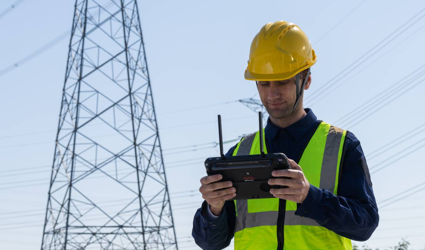 drone flying near a high voltage power line