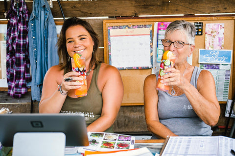 Nikki and Susie enjoying Mojitos in the greenhouse