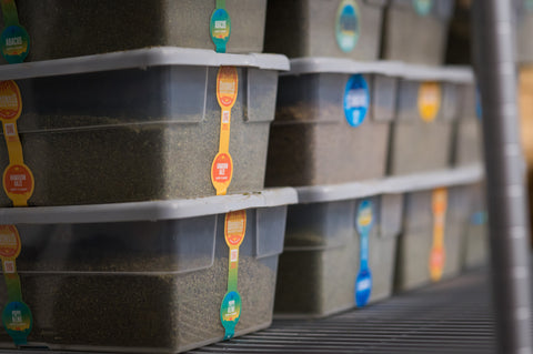 Boxes of ground hemp stacked on top of one another